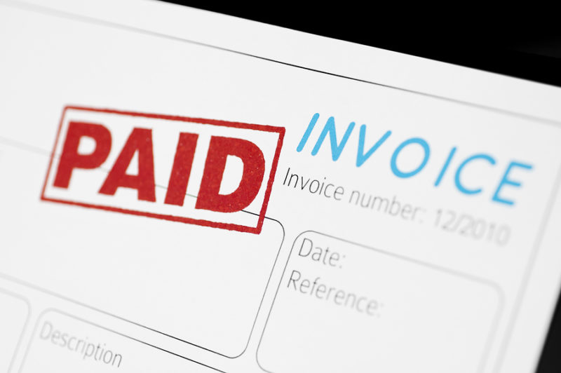 Paid Invoice Two men meeting